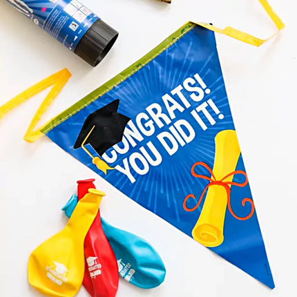 slinger met de tekst congrats you did it in het paars en geel